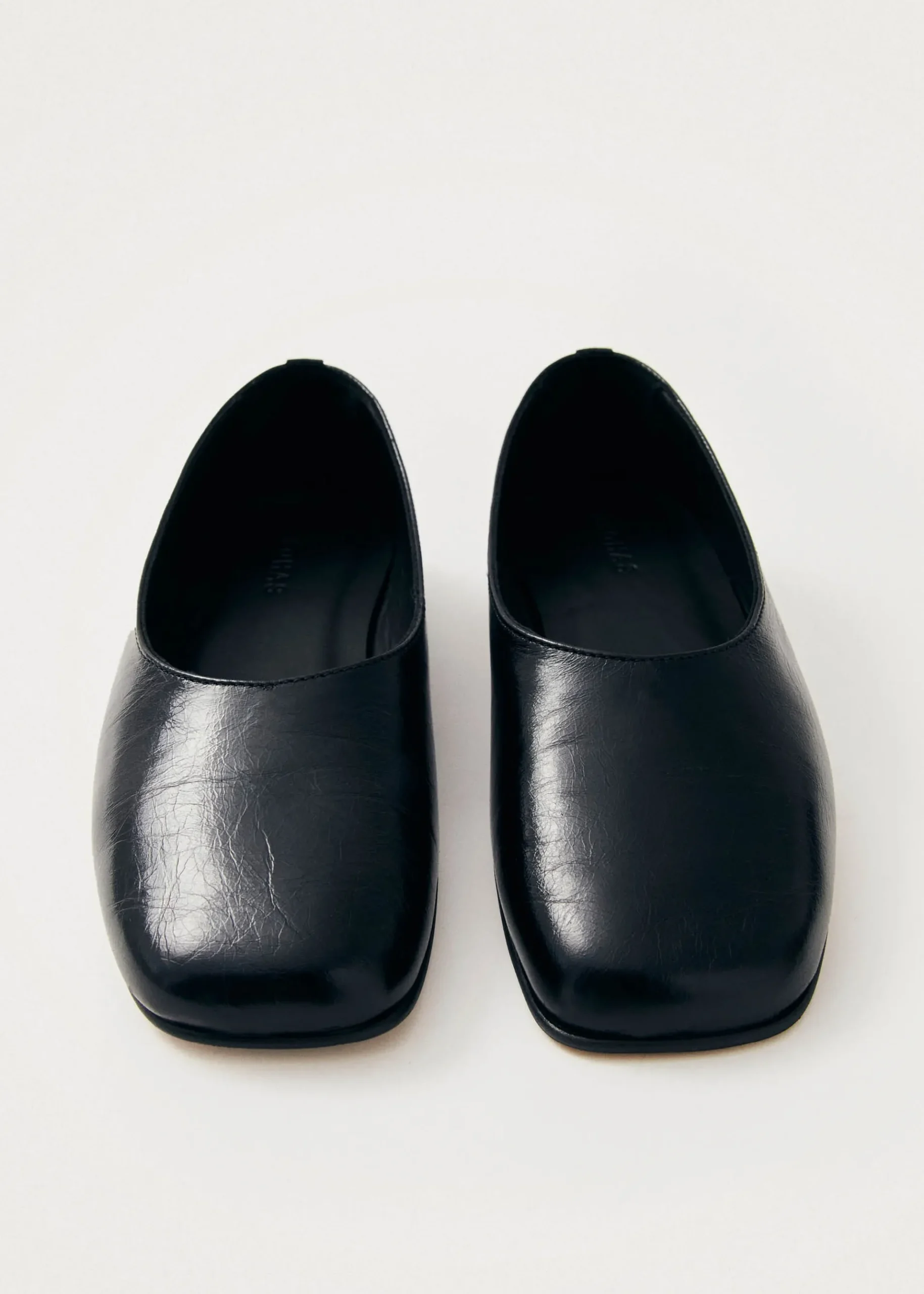 Edie Schwarze Leder-Ballerinas