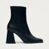 South Bicolor Schwarze und beigefarbene Lederstiefel